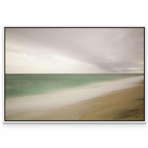 a picture of a beach with waves coming in