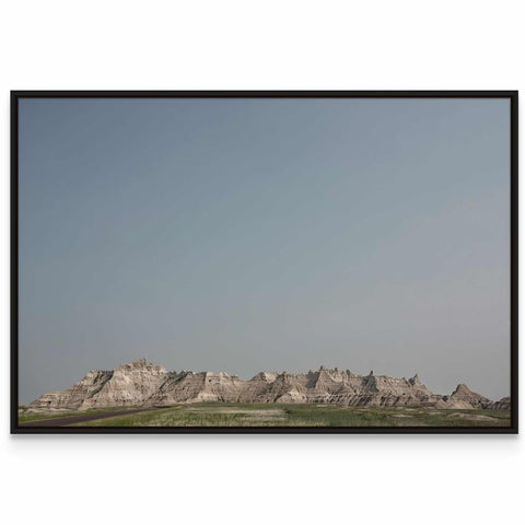 a picture of a mountain range with a sky background