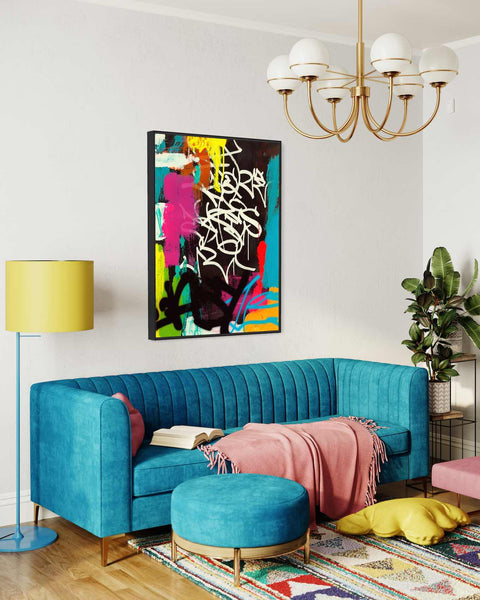 a living room with a blue couch and ottoman