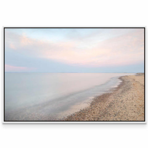 a picture of a beach with the ocean in the background