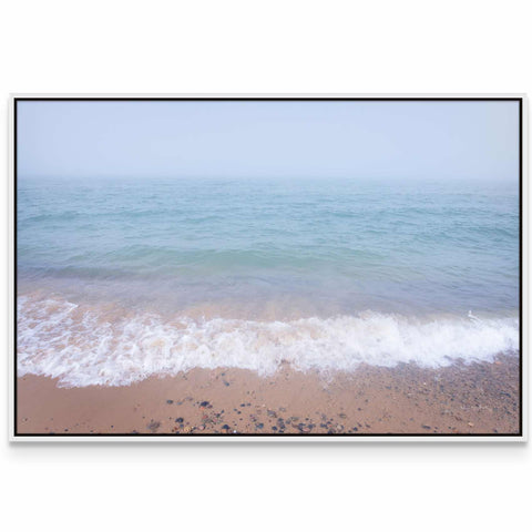 a picture of a beach with waves coming in