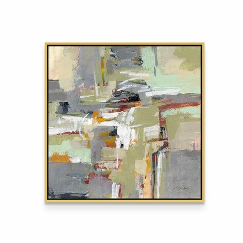 an abstract painting in a gold frame on a white wall