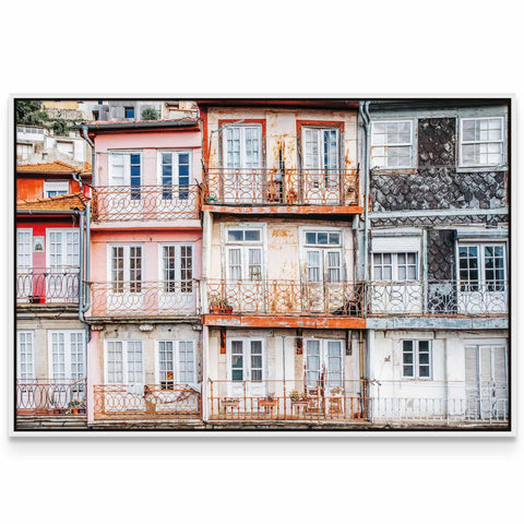 a group of buildings with balconies and balconies on them