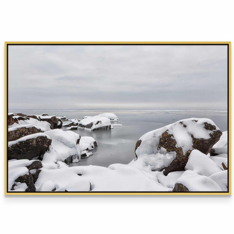 a picture of some rocks covered in snow