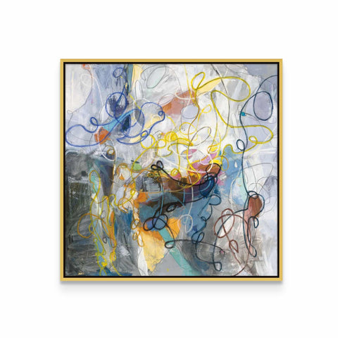 an abstract painting in a gold frame on a white wall