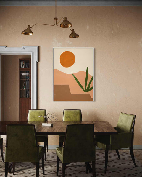 a dining room table with green chairs and a painting on the wall