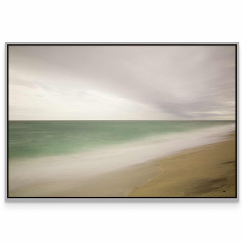 a picture of a beach with waves coming in