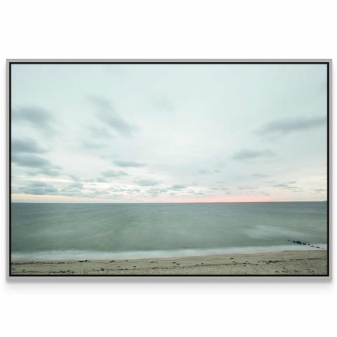 a picture of a beach with the ocean in the background