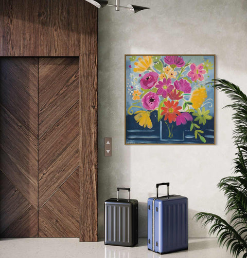 two pieces of luggage sitting next to a wooden door