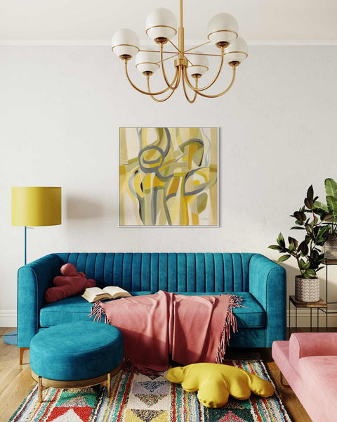 a living room with a blue couch and a rug