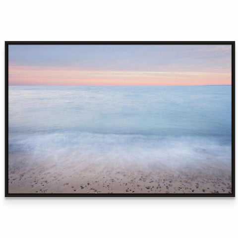 a picture of a beach with the ocean in the background