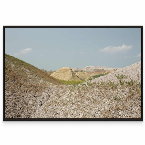 a picture of a hill with grass and dirt