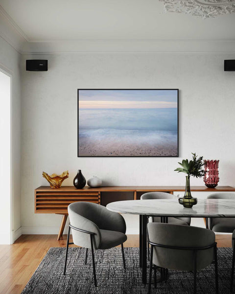 a dining room with a table and chairs