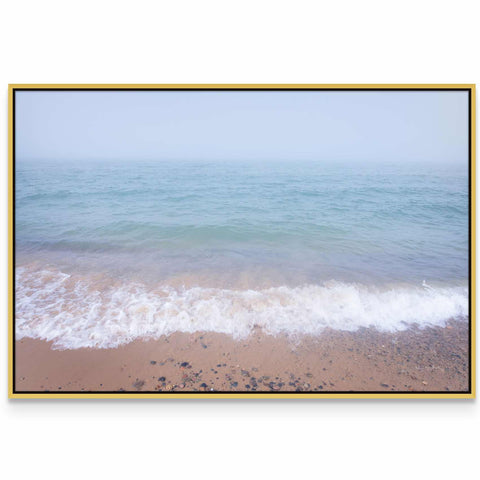 a picture of a beach with waves coming in