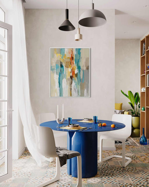 a dining room with a blue table and white chairs