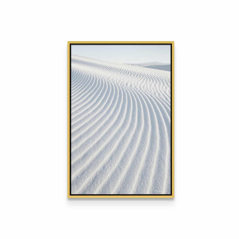 a picture of a white sand dune with a gold frame