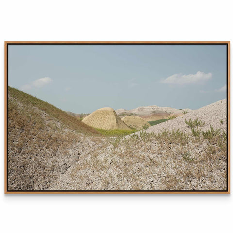 a picture of a hill with grass and dirt